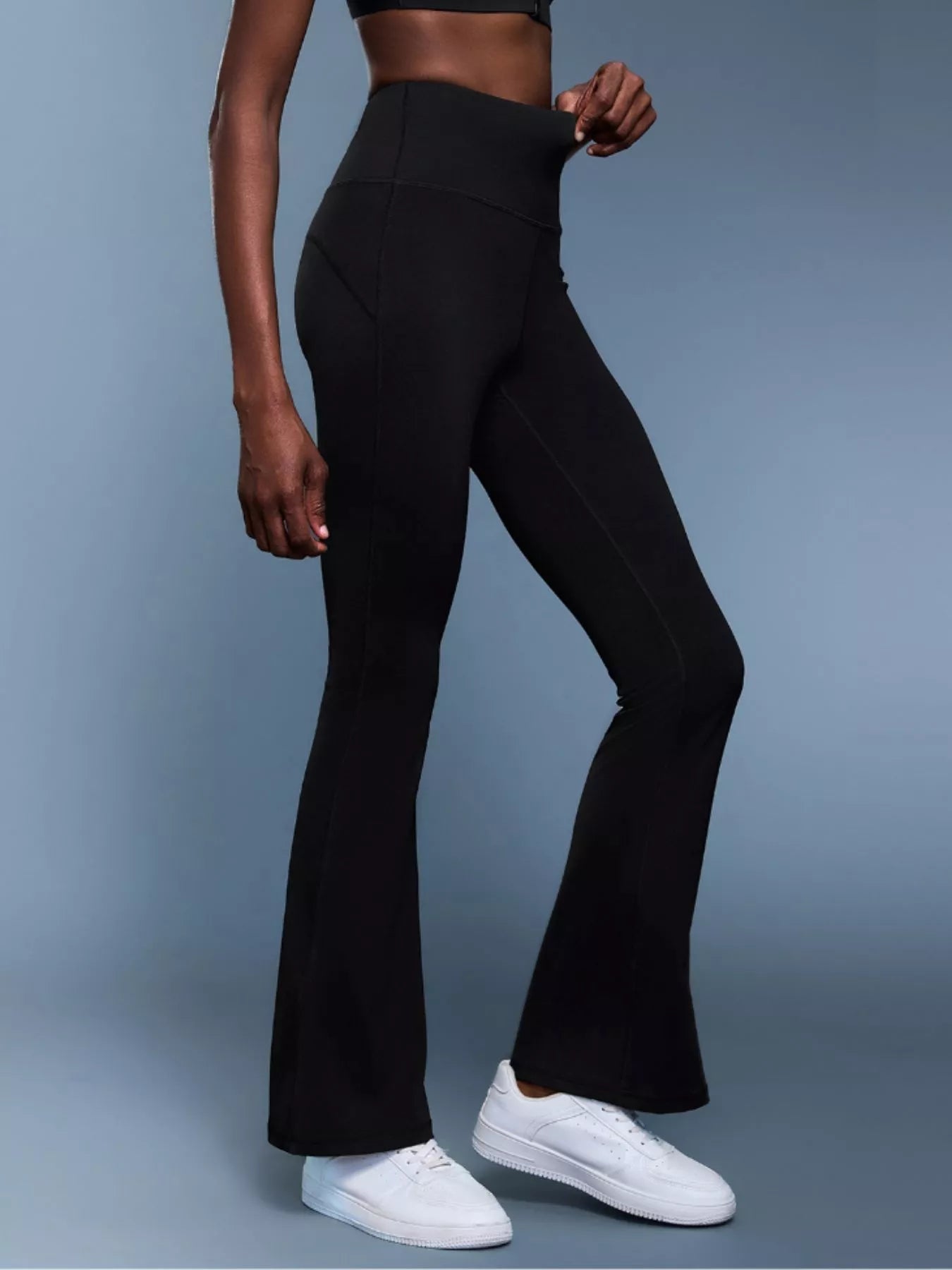Flare active pants styled with fitted tank