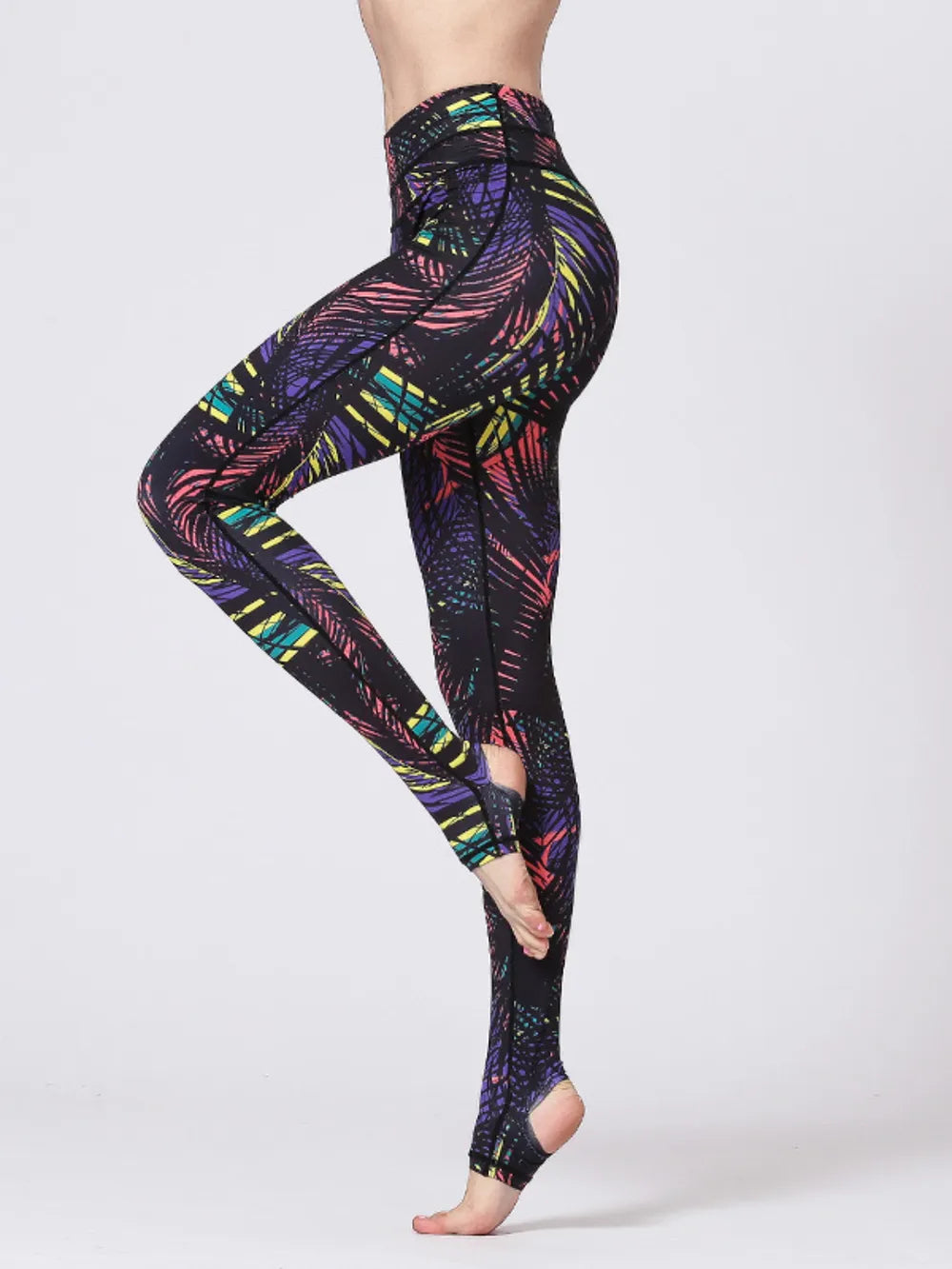 Printed stirrup leggings side profile showing wide waistband