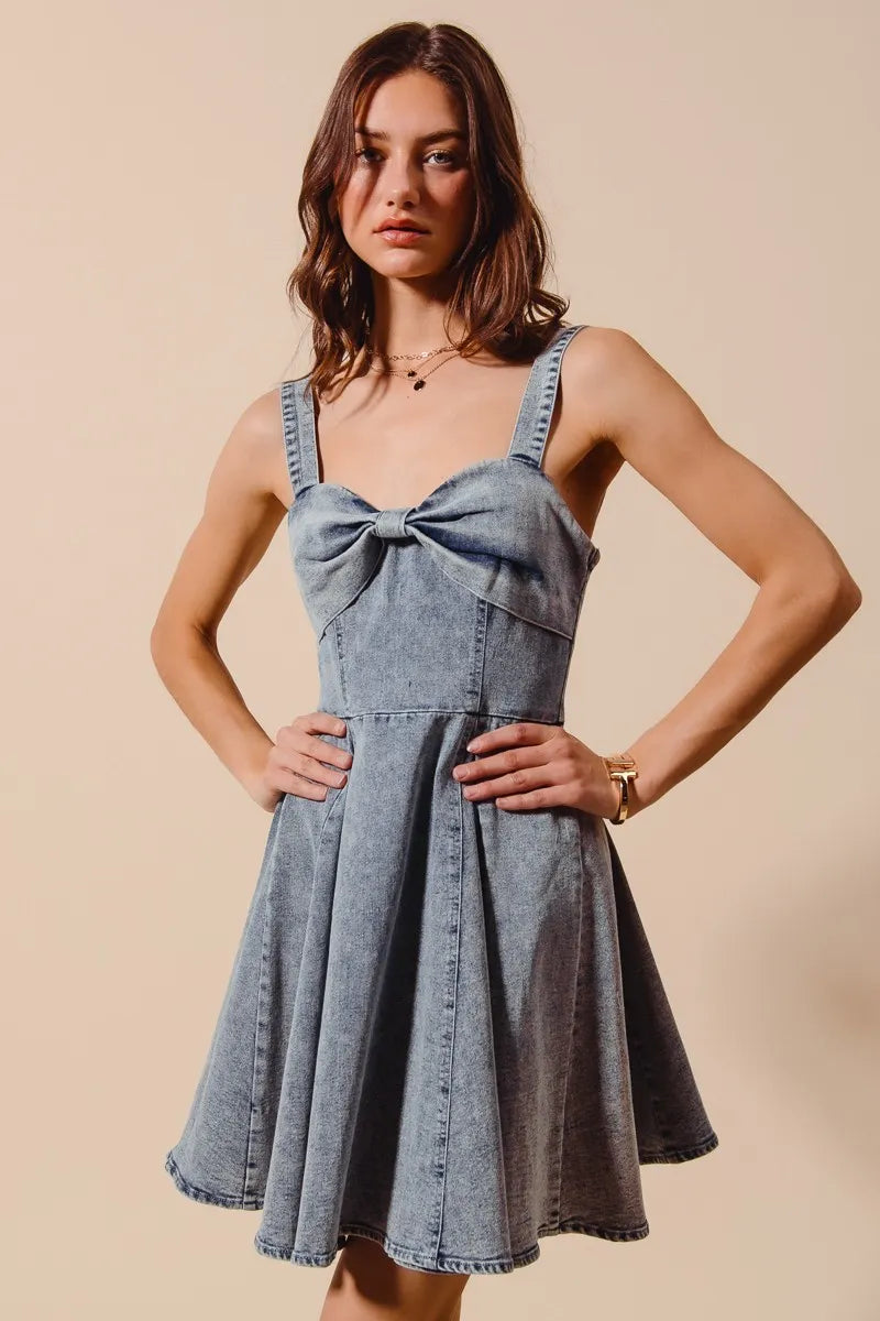 Denim flare dress styled with sneakers