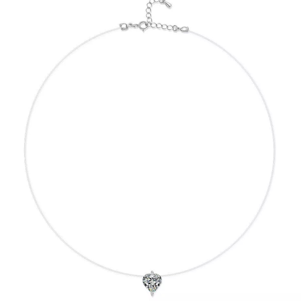 Moissanite heart necklace worn on model