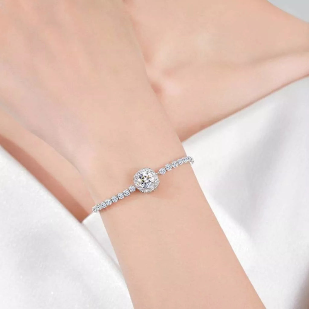 Moissanite sterling silver chain bracelet on wrist