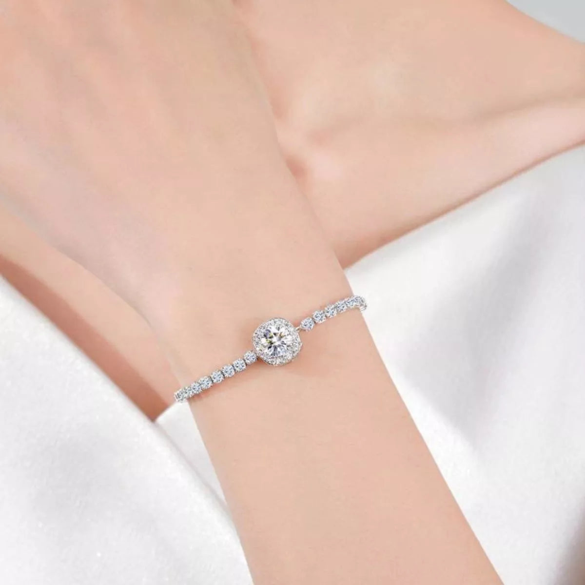 Moissanite sterling silver chain bracelet on wrist