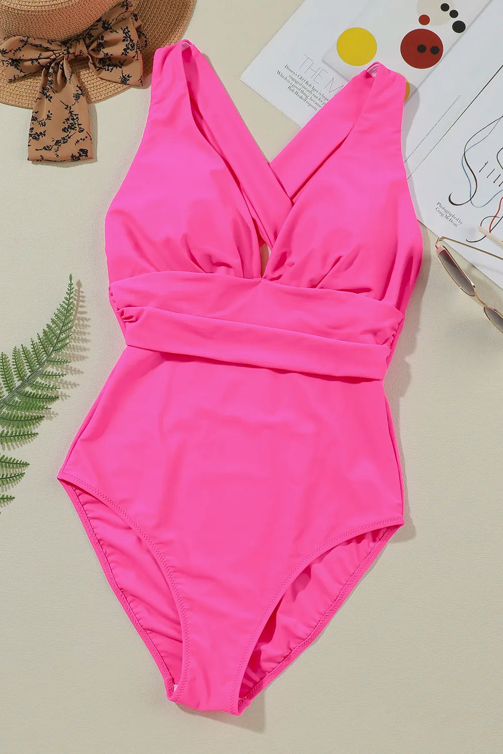 Wide strap swimsuit on model at the beach