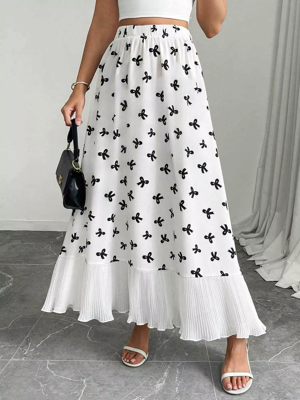 Bow print ruffle hem maxi skirt front view