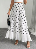 Bow print ruffle hem maxi skirt front view