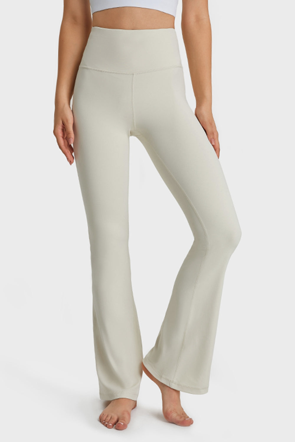 Flare yoga pants in navy on model