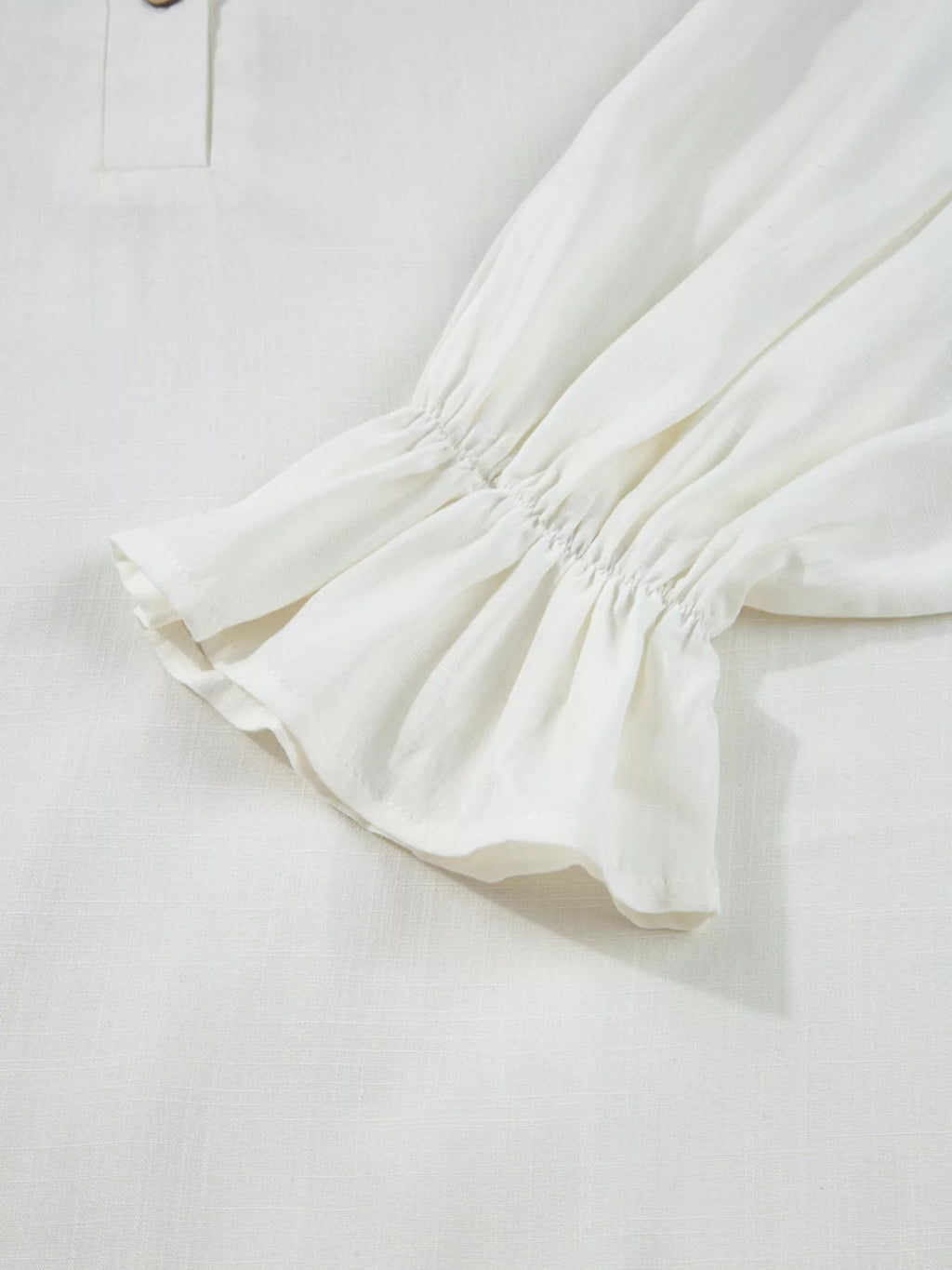 White button down blouse fabric close up
