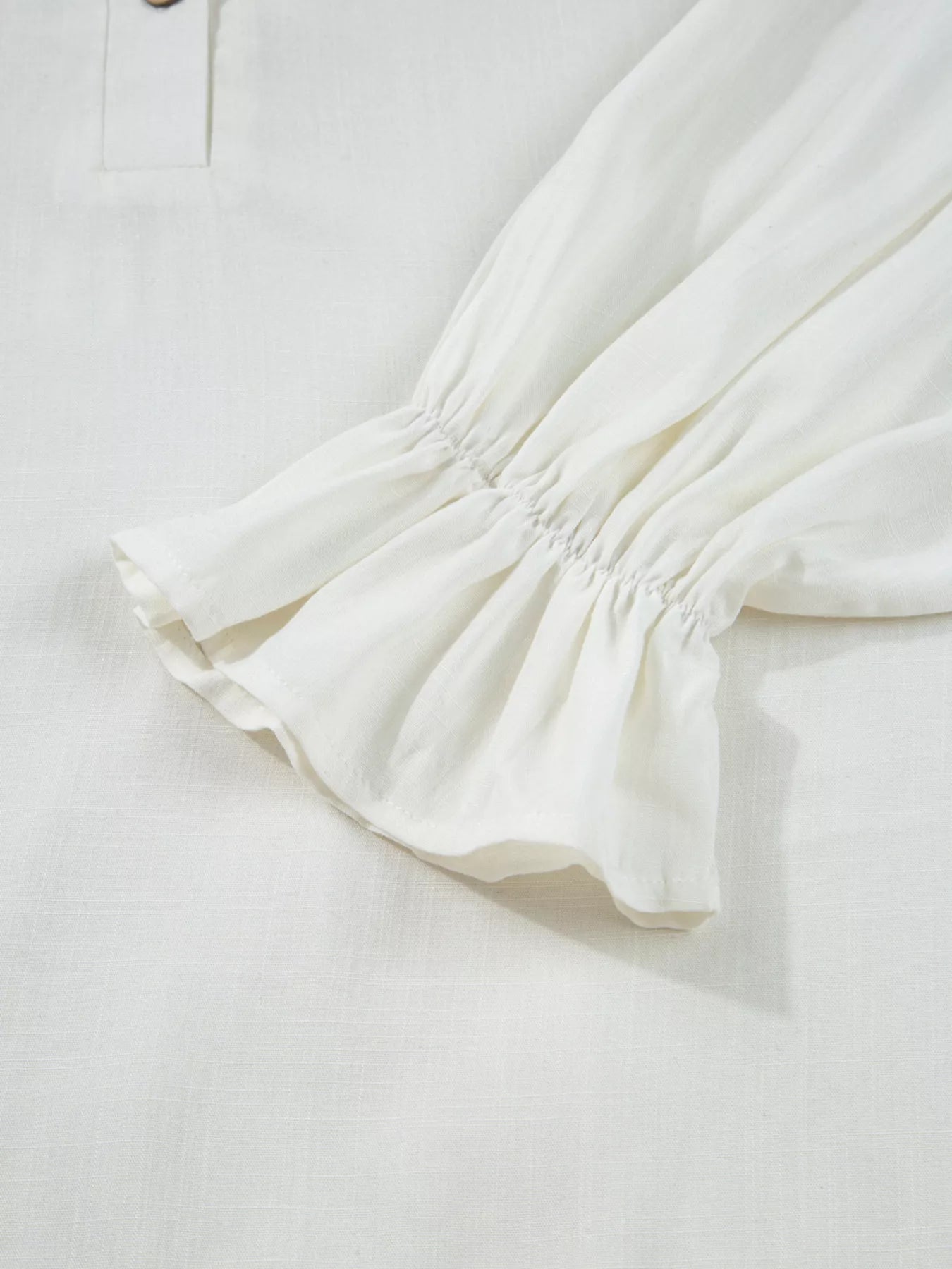 White button down blouse fabric close up