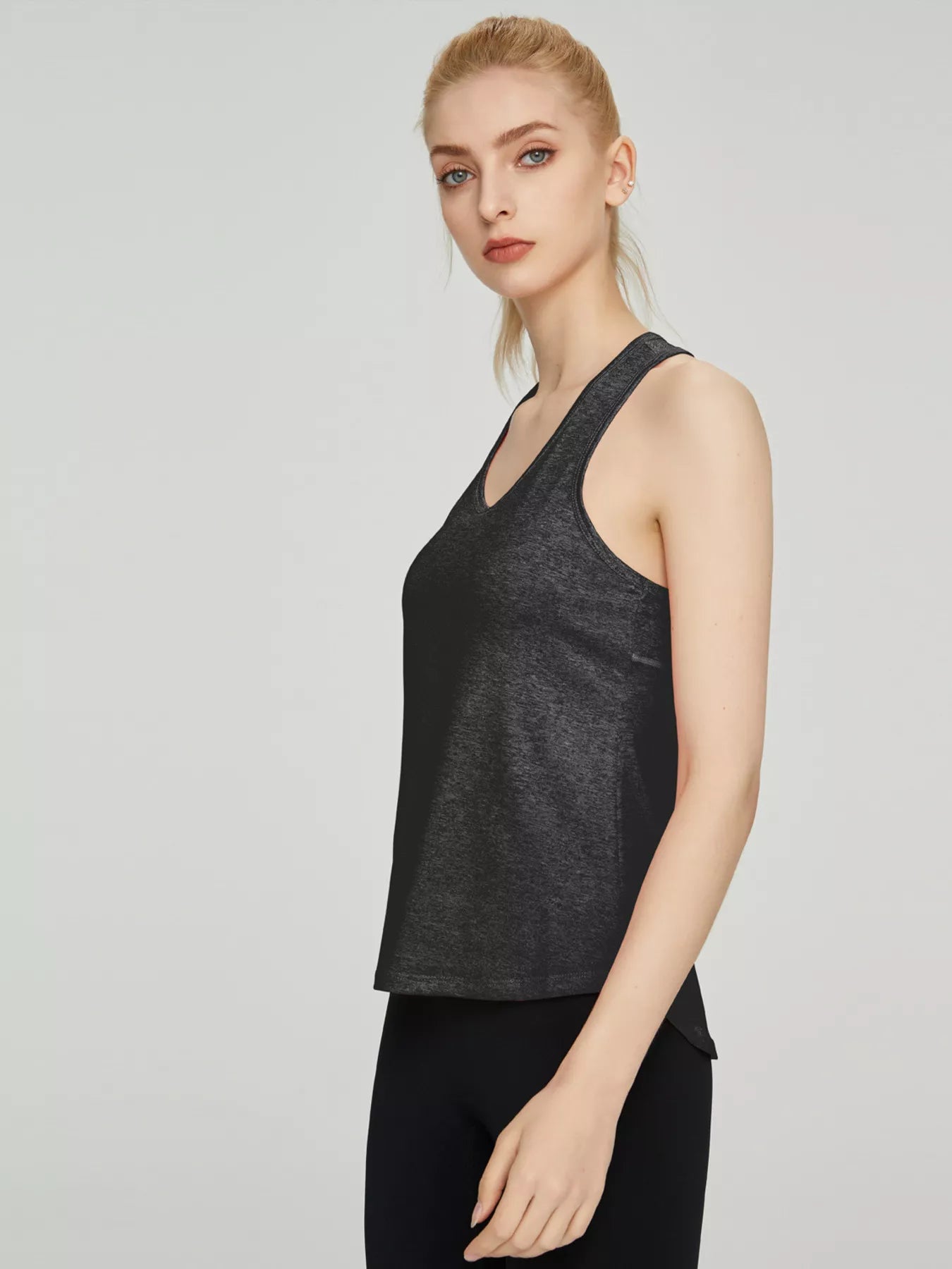 Black active tank top seam detail on model