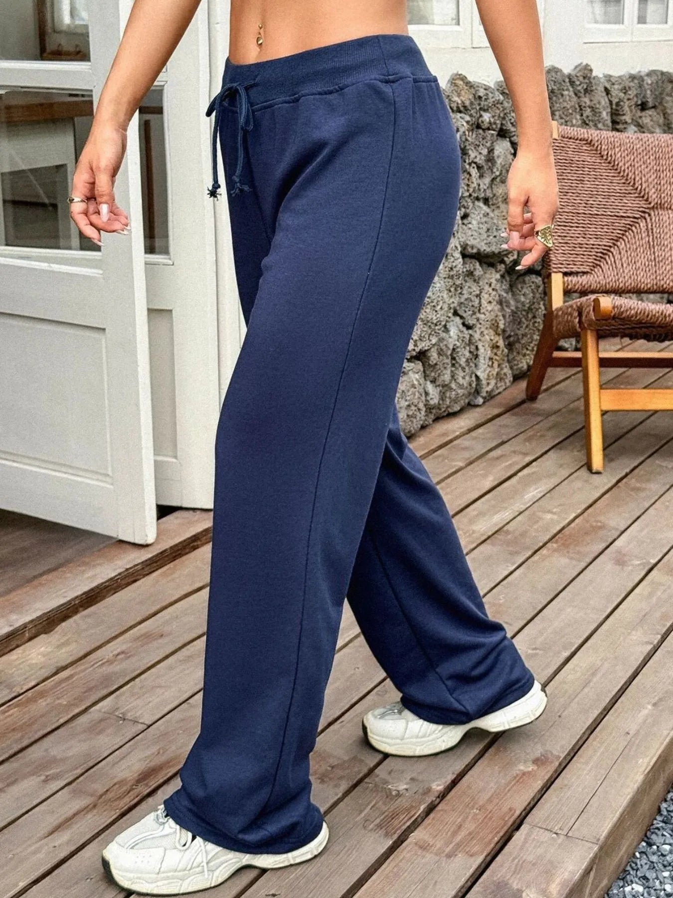 Navy athleisure pants back view showing wide leg fit