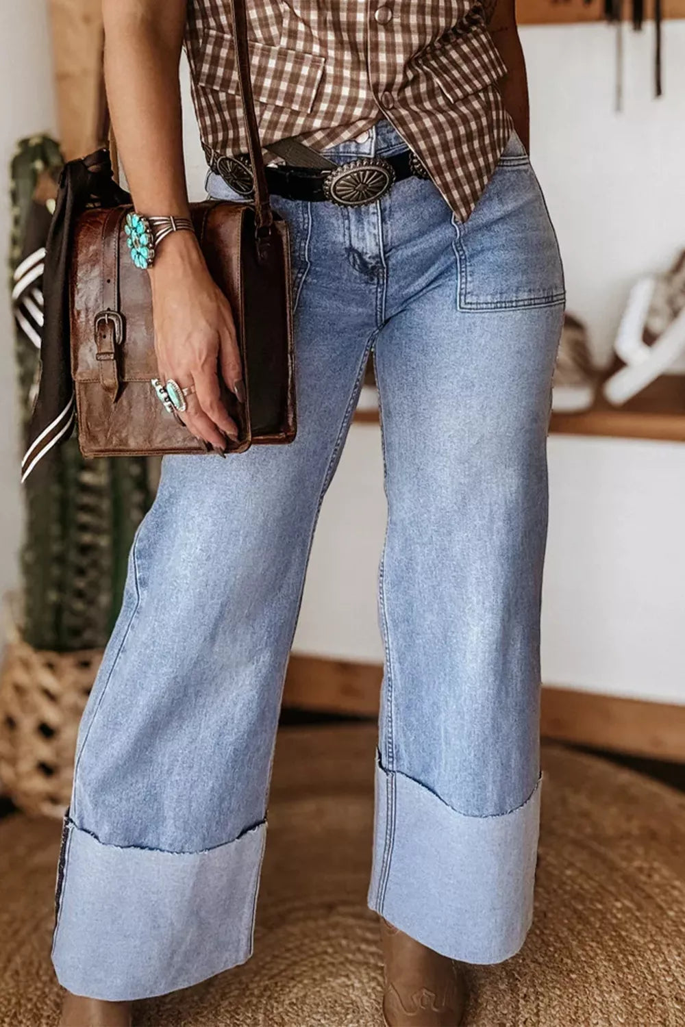 Turn up cuff detail on loose fit jeans