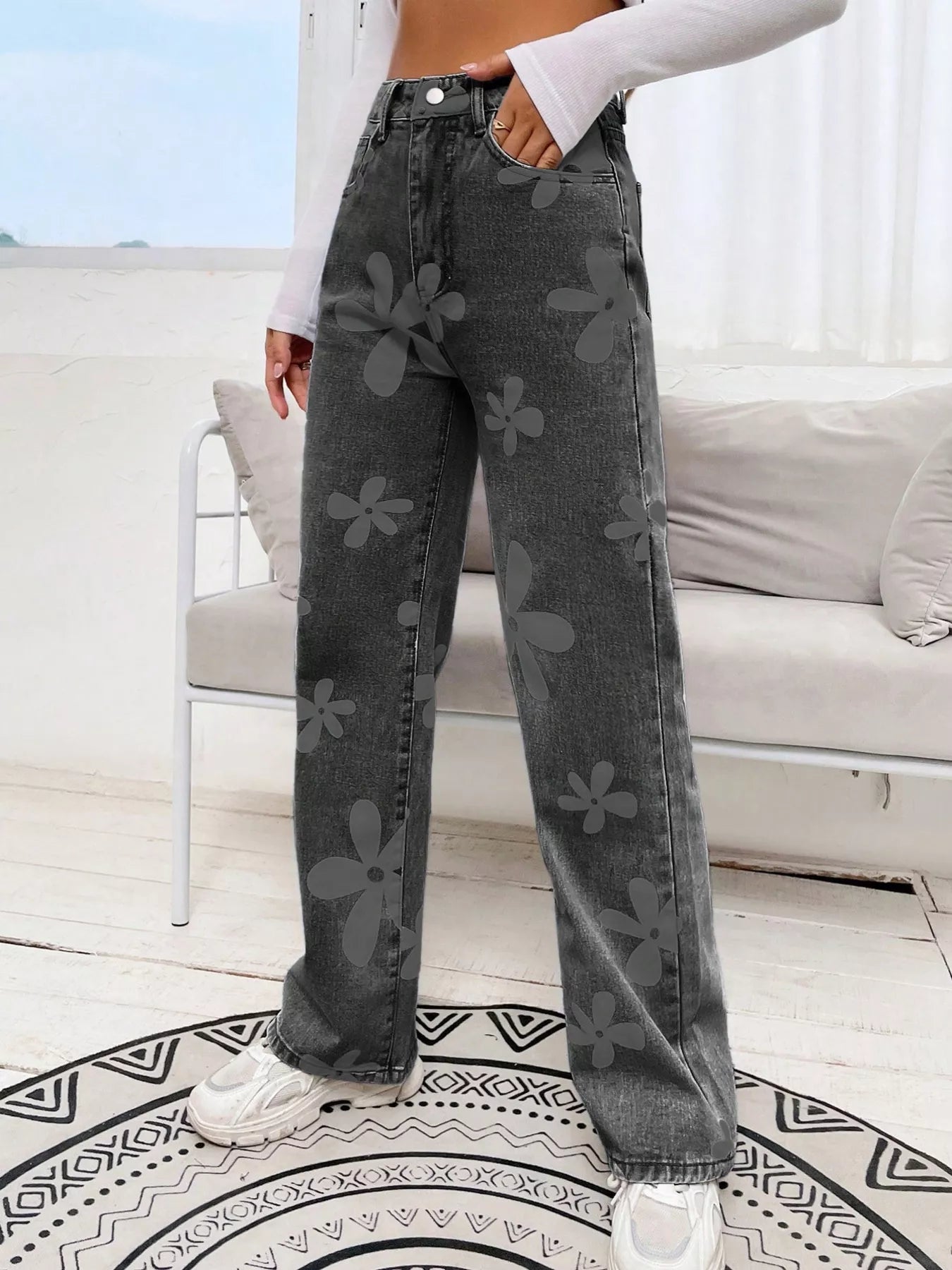 Floral pattern detail on dark blue denim