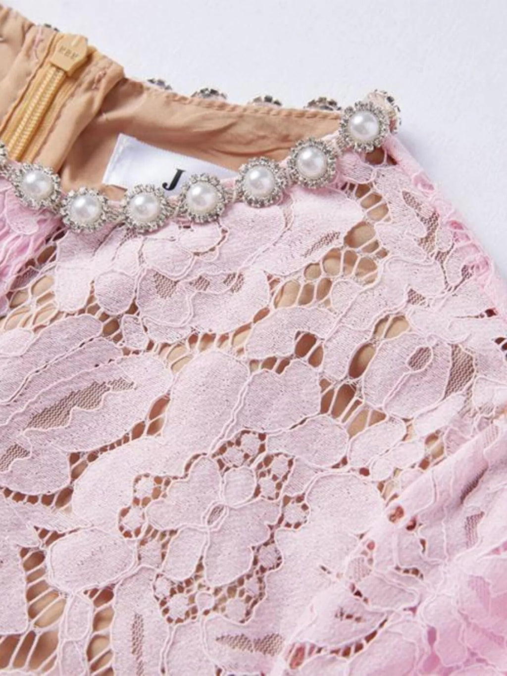 White lace dress detail