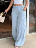 Washed wide leg jeans in light blue front view on model