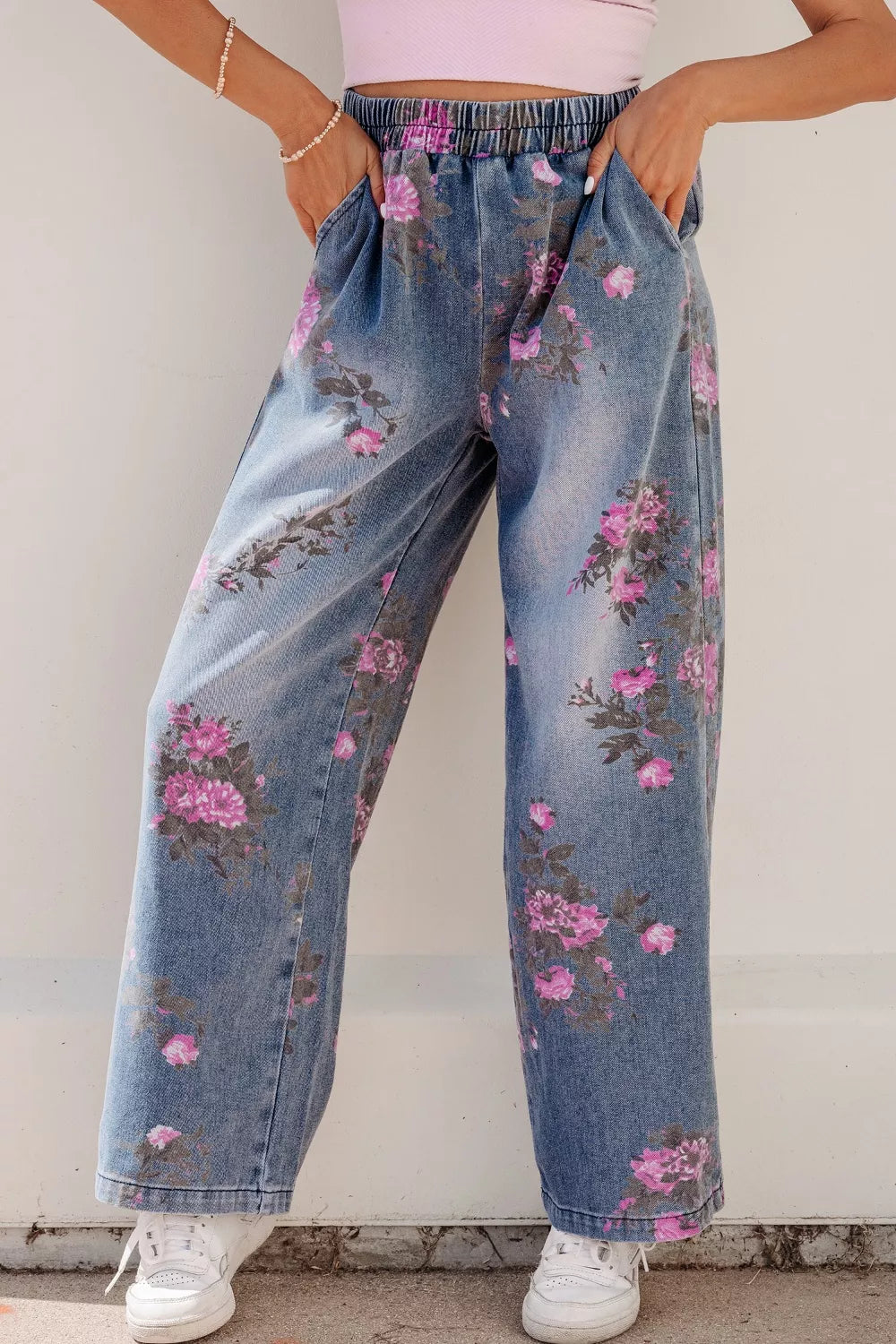 Elastic waistband detail on floral print jeans