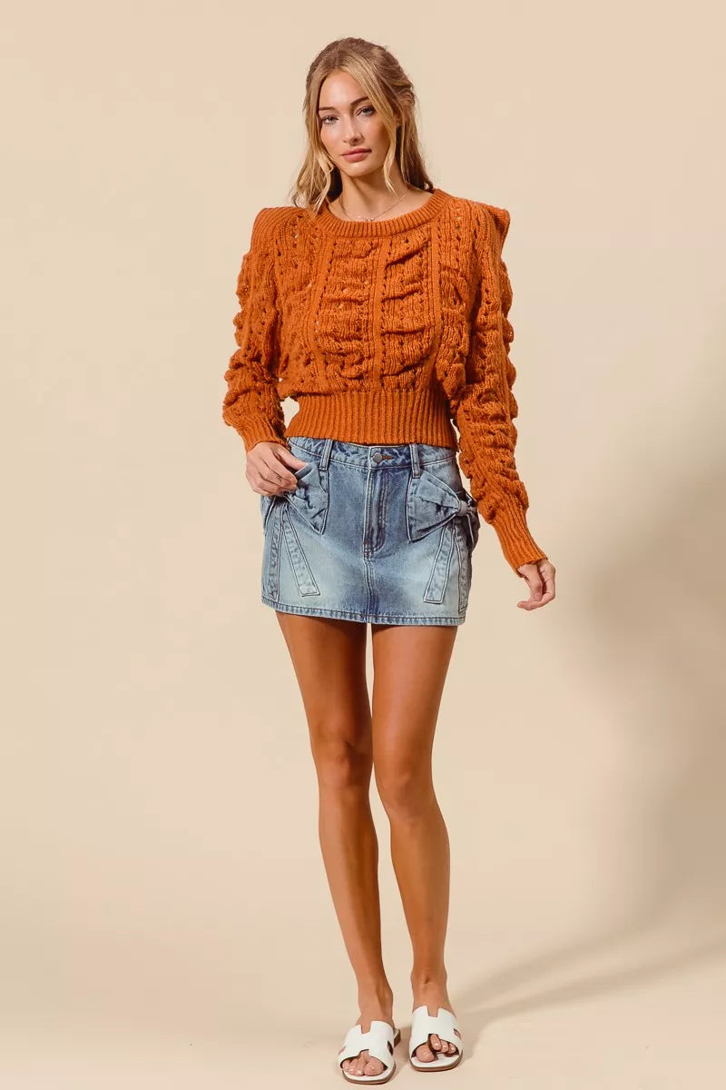 Denim skirt styled with tee and sneakers