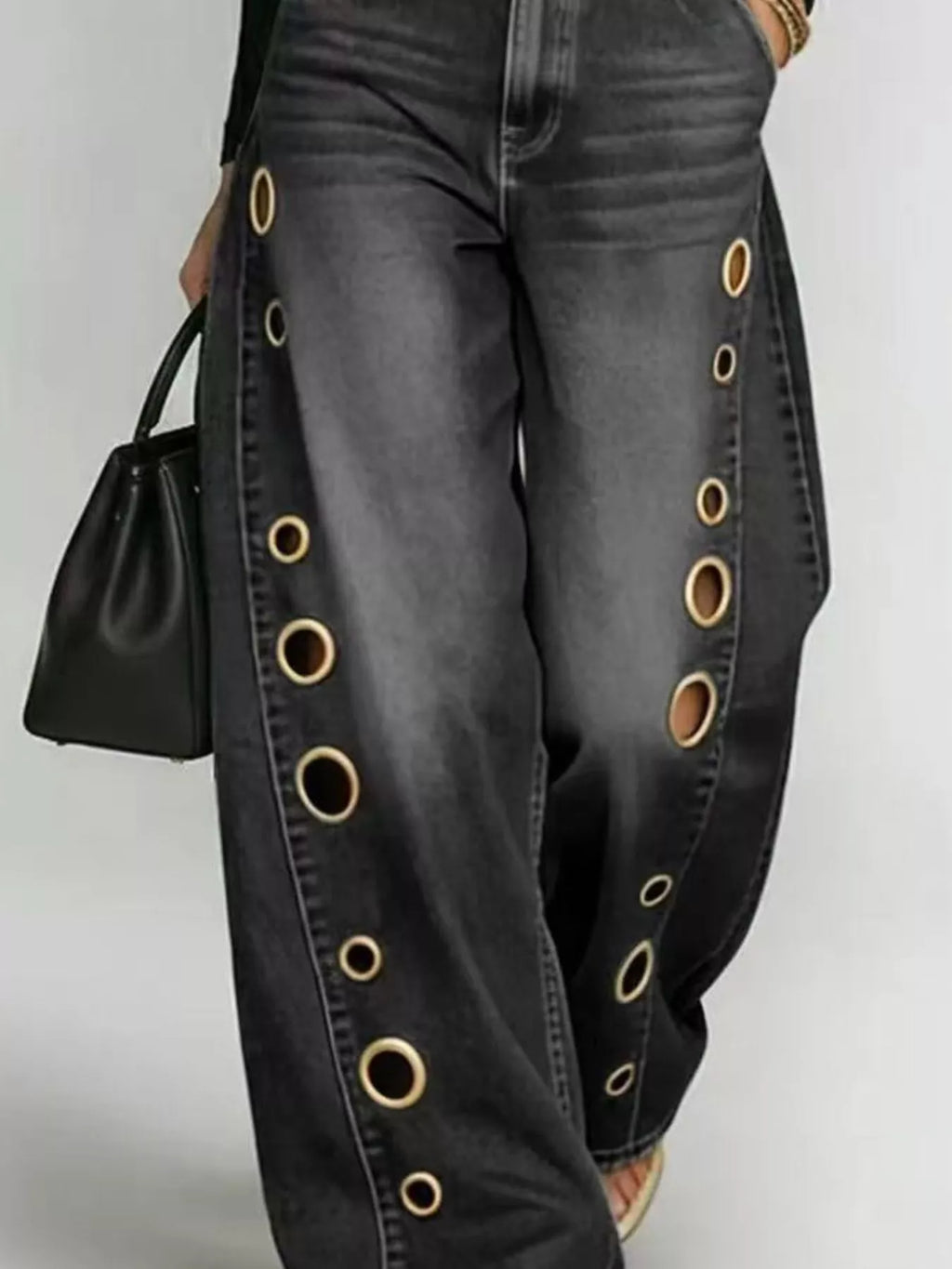 Wide leg silhouette of eyelet jeans