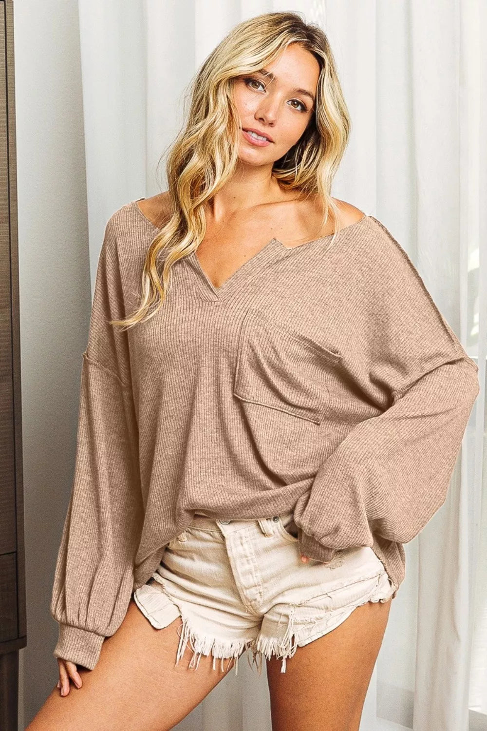 Exposed seam long sleeve top front view in taupe