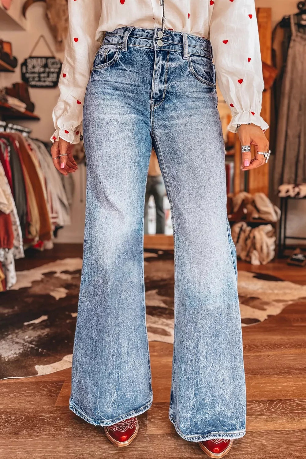 Acid wash flare jeans with pocket detail front view