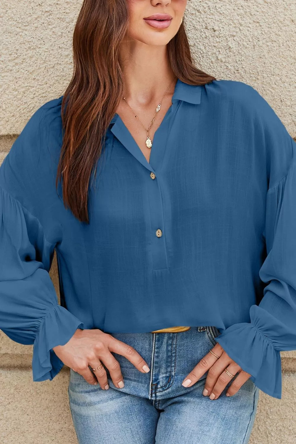 Button detail blouse back view in peacock blue