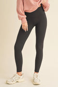 Fleece lined high waisted leggings front view in black
