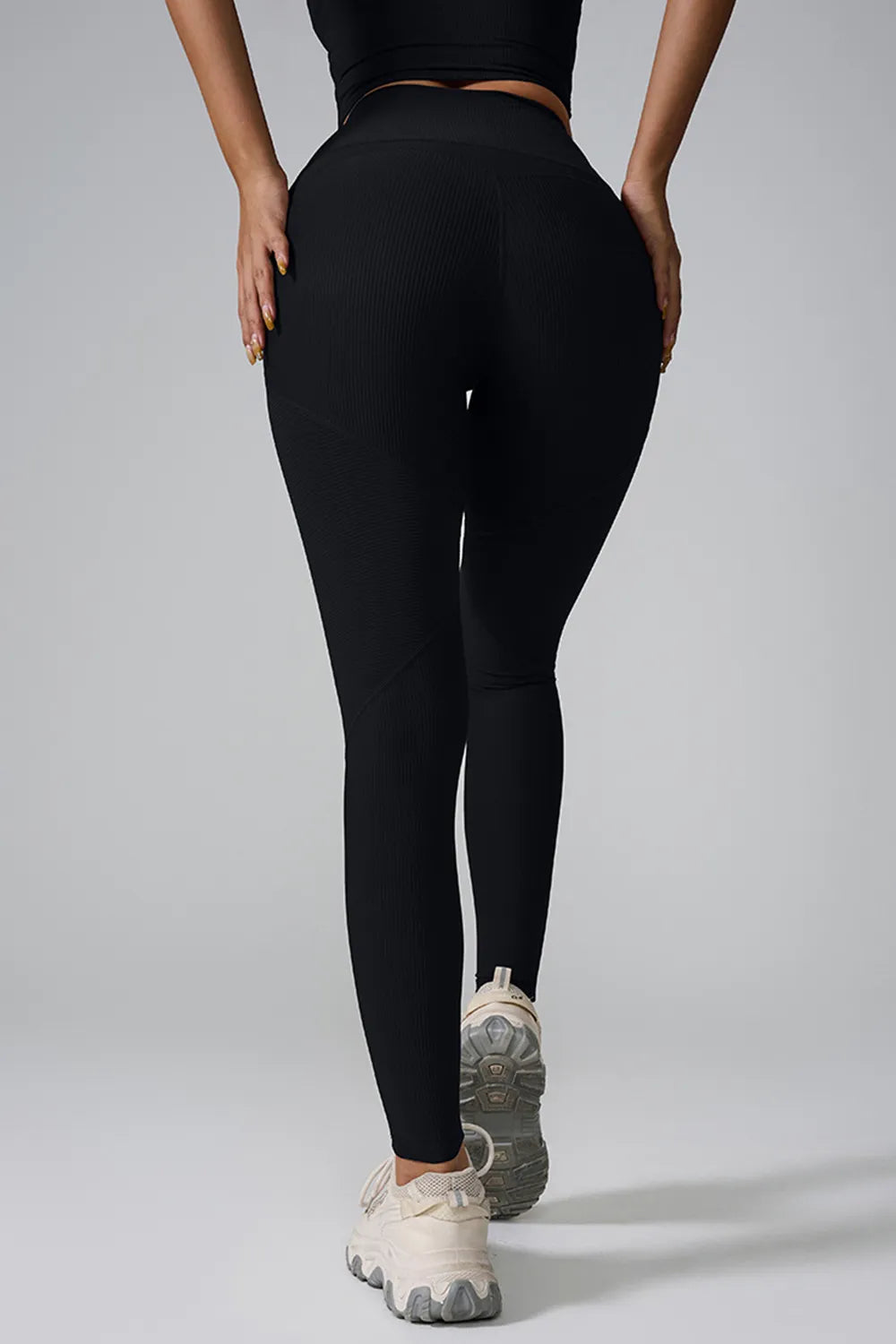 Model wearing high waist active leggings