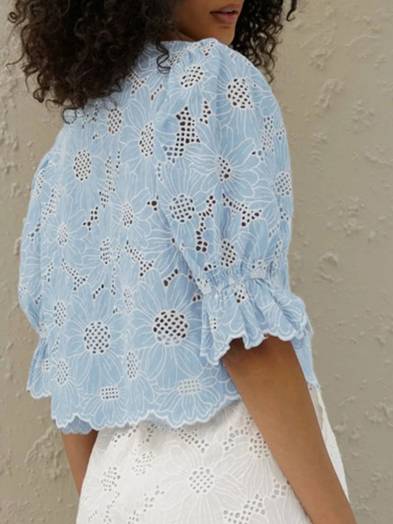 Button front flounce sleeve blouse detail