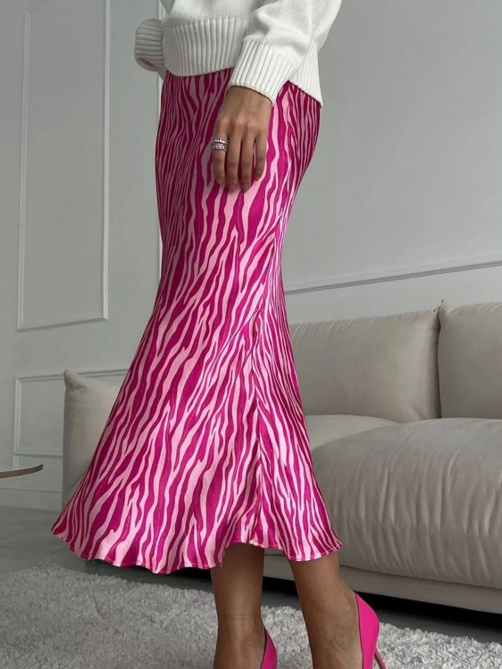 Dusty pink satin midi skirt on model