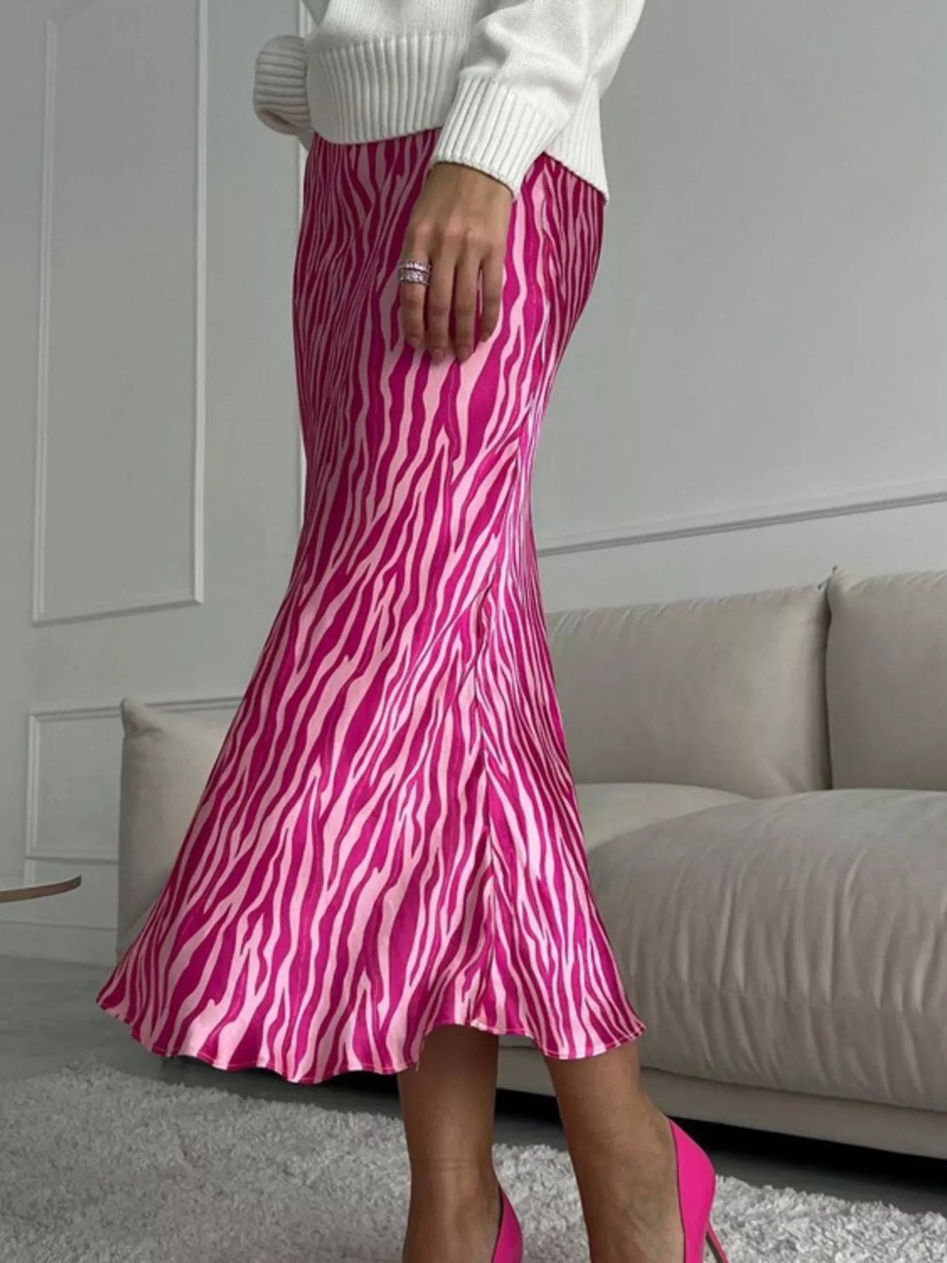 Dusty pink satin midi skirt on model