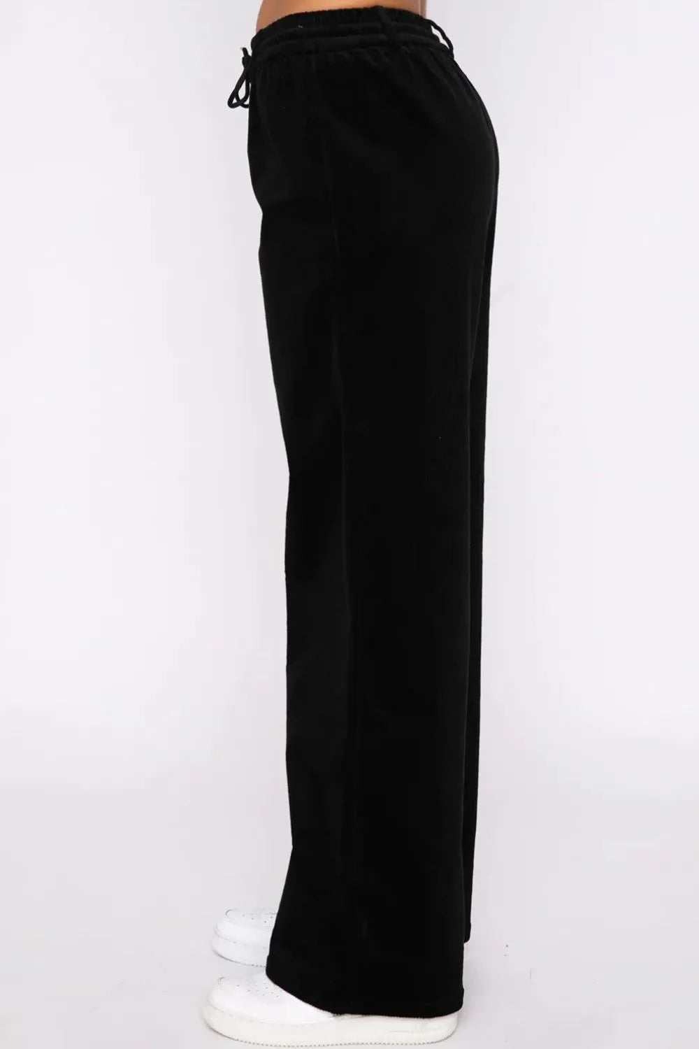 Drawstring waist detail on wide leg pants
