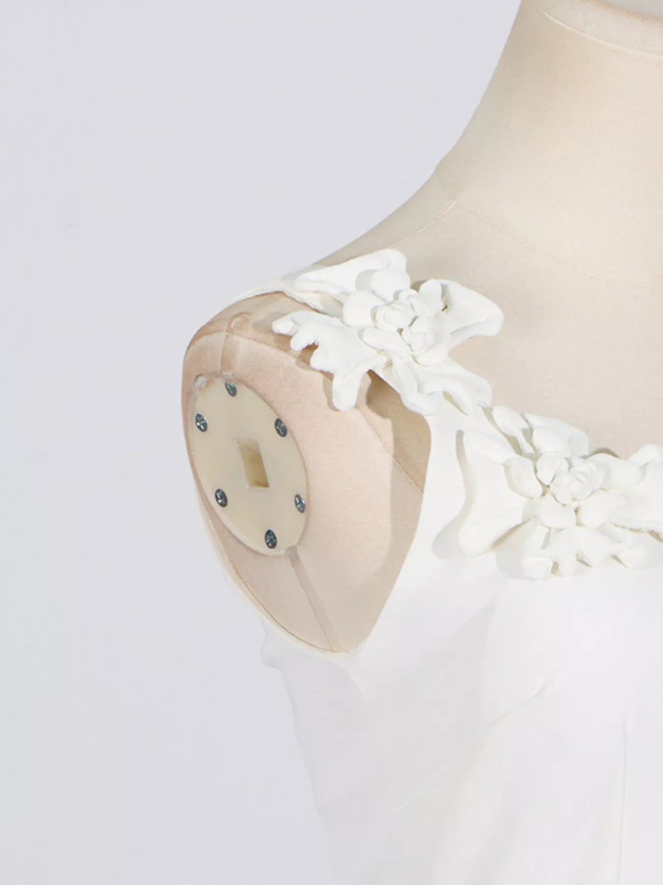 Zipper closure detail on white midi dress