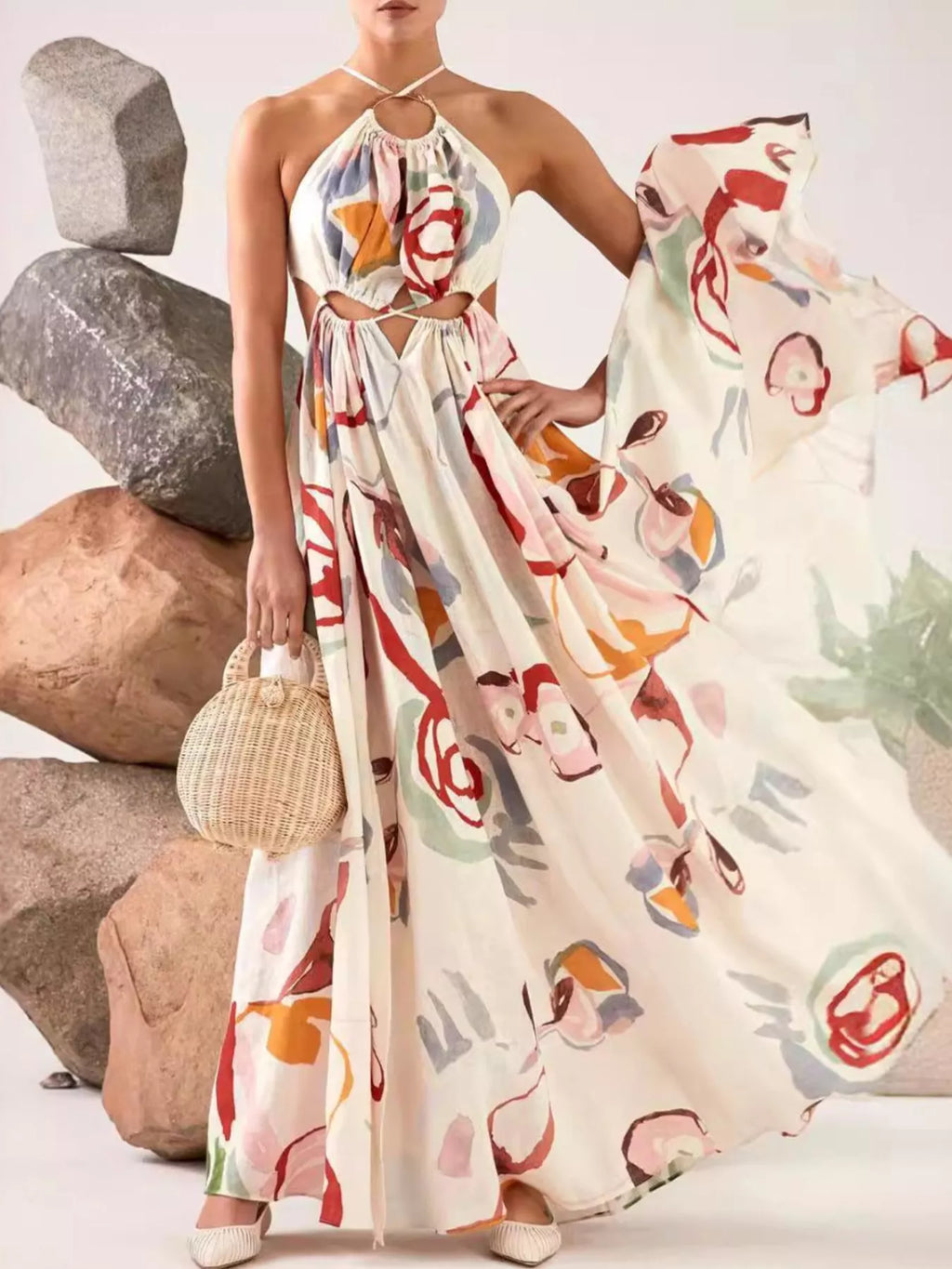 Cutout and tie detail on white halter maxi dress