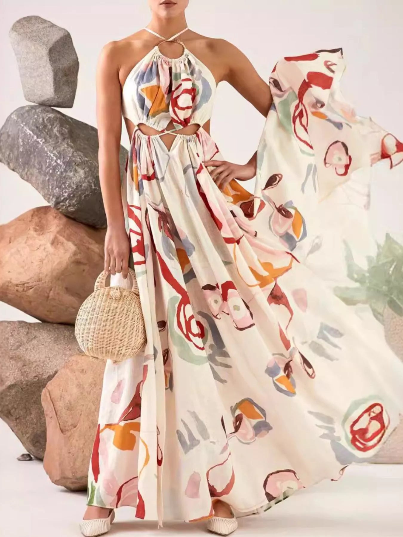 Cutout and tie detail on white halter maxi dress