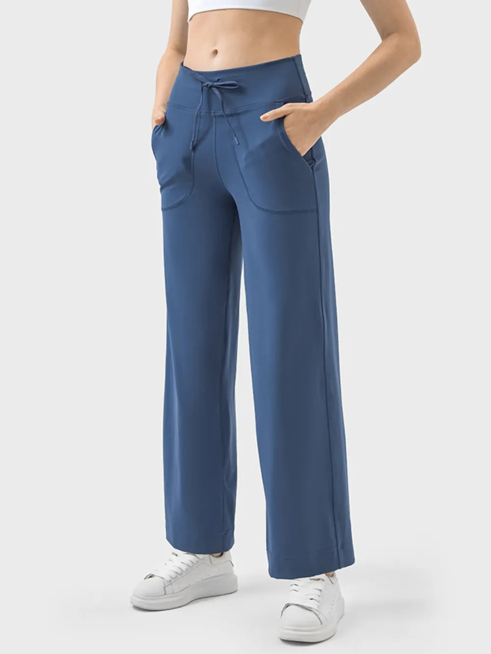 Active pants side view showing tapered leg and side pocket