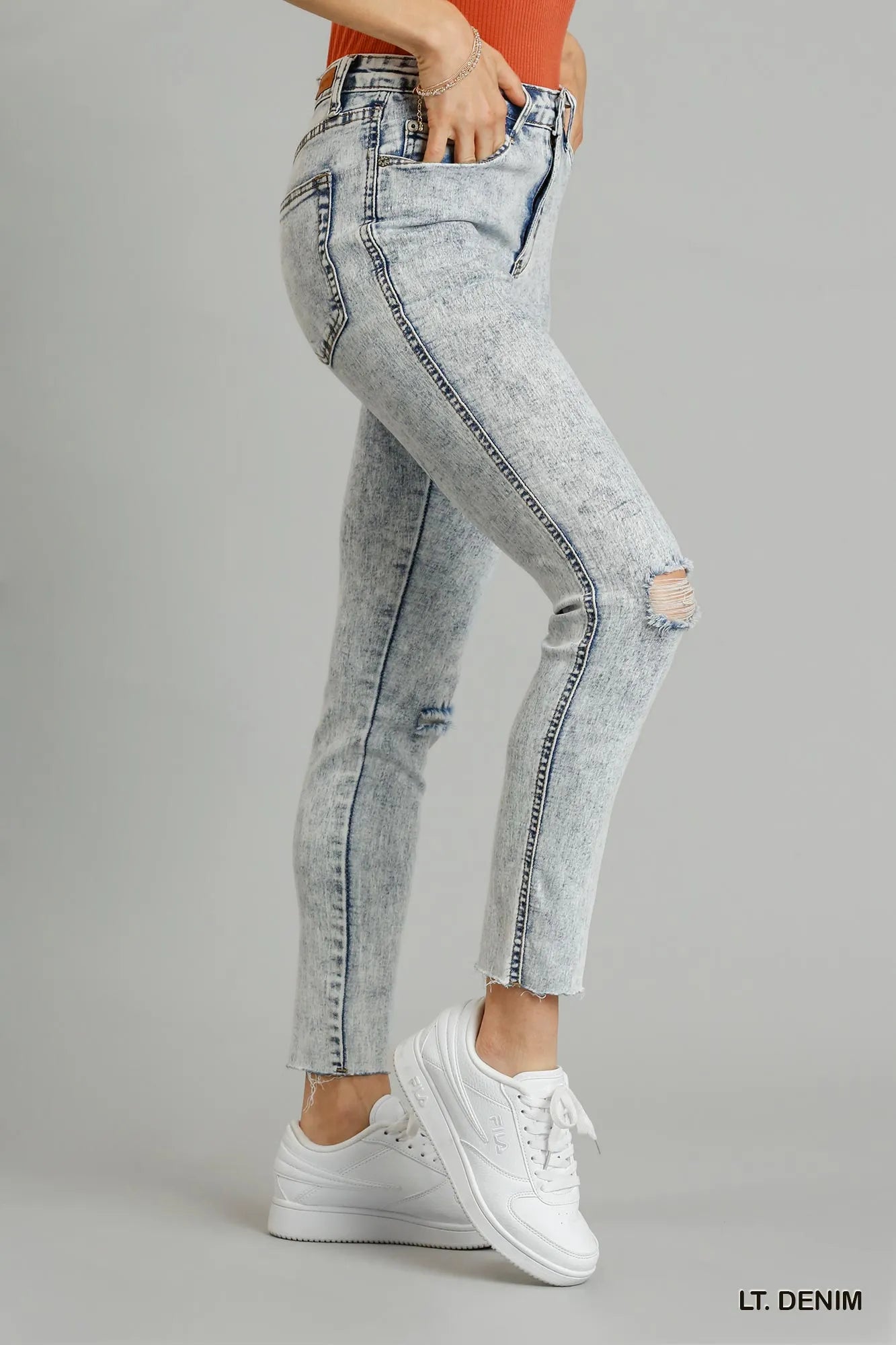 Light wash denim skinny jeans back pocket view