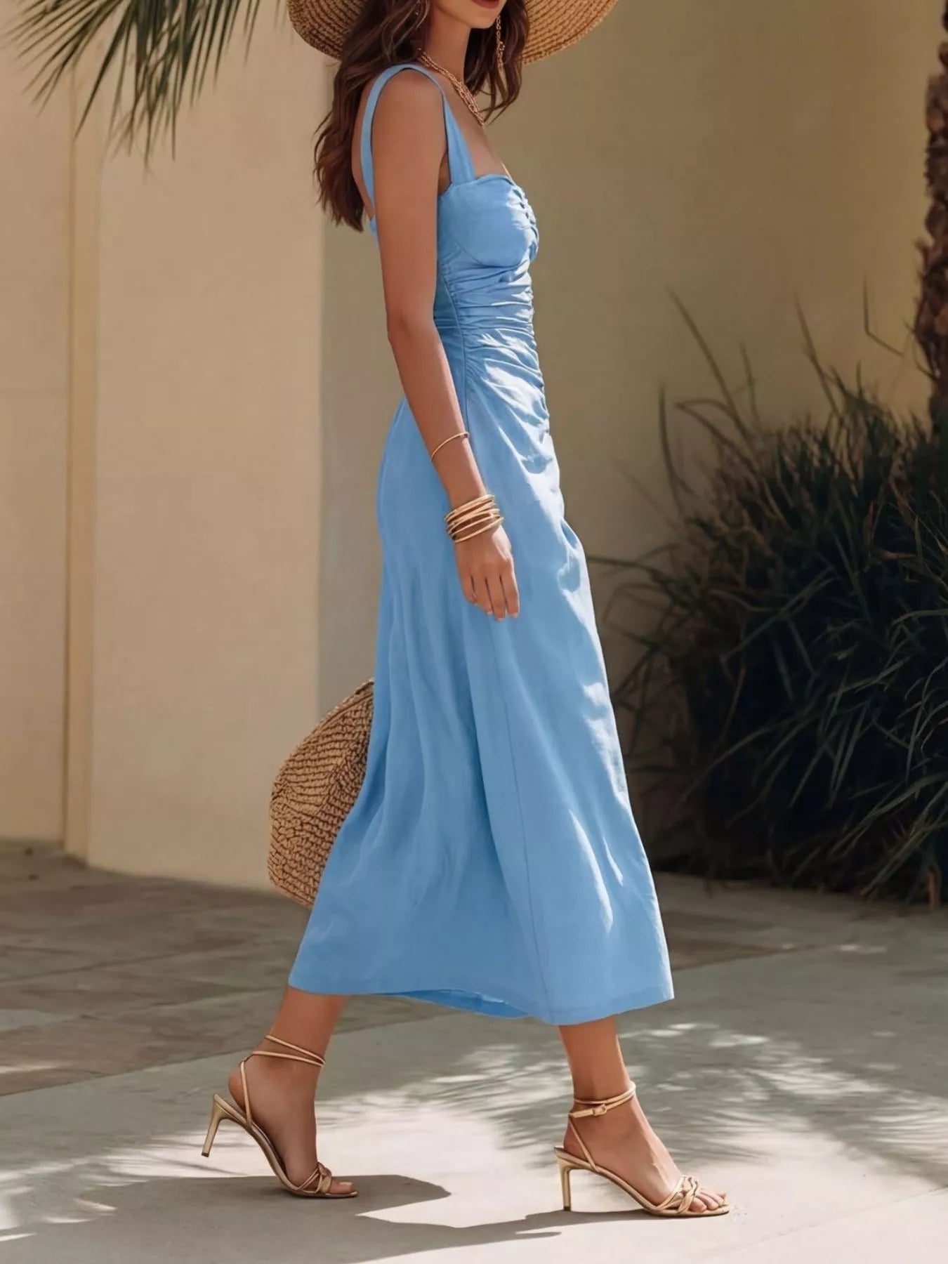Ruched detailing close up on fitted midi dress