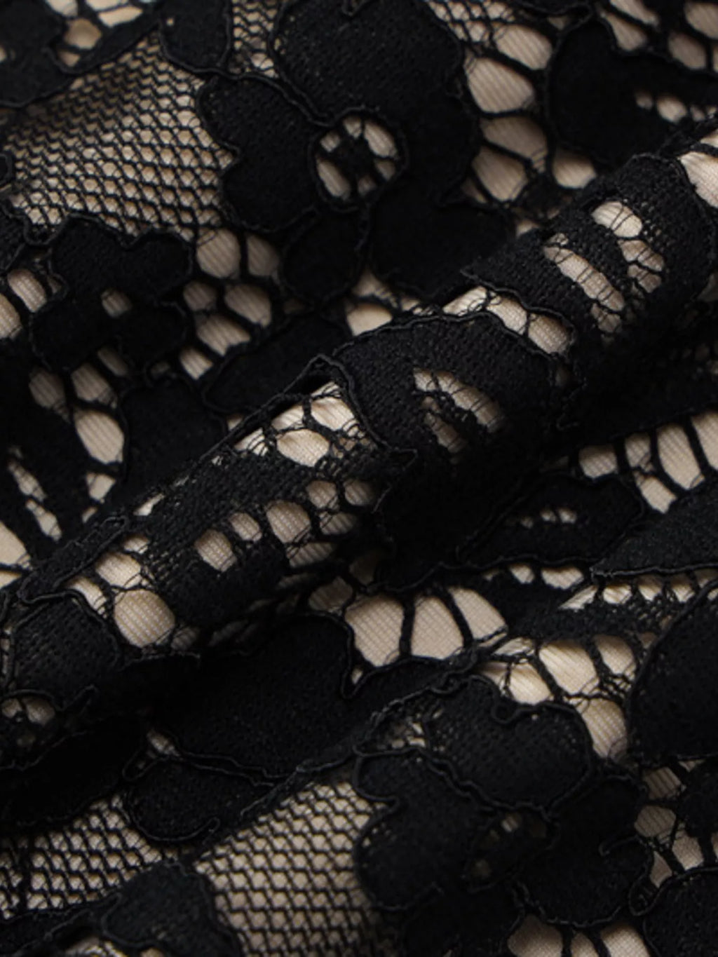Lace mini dress fabric texture detail