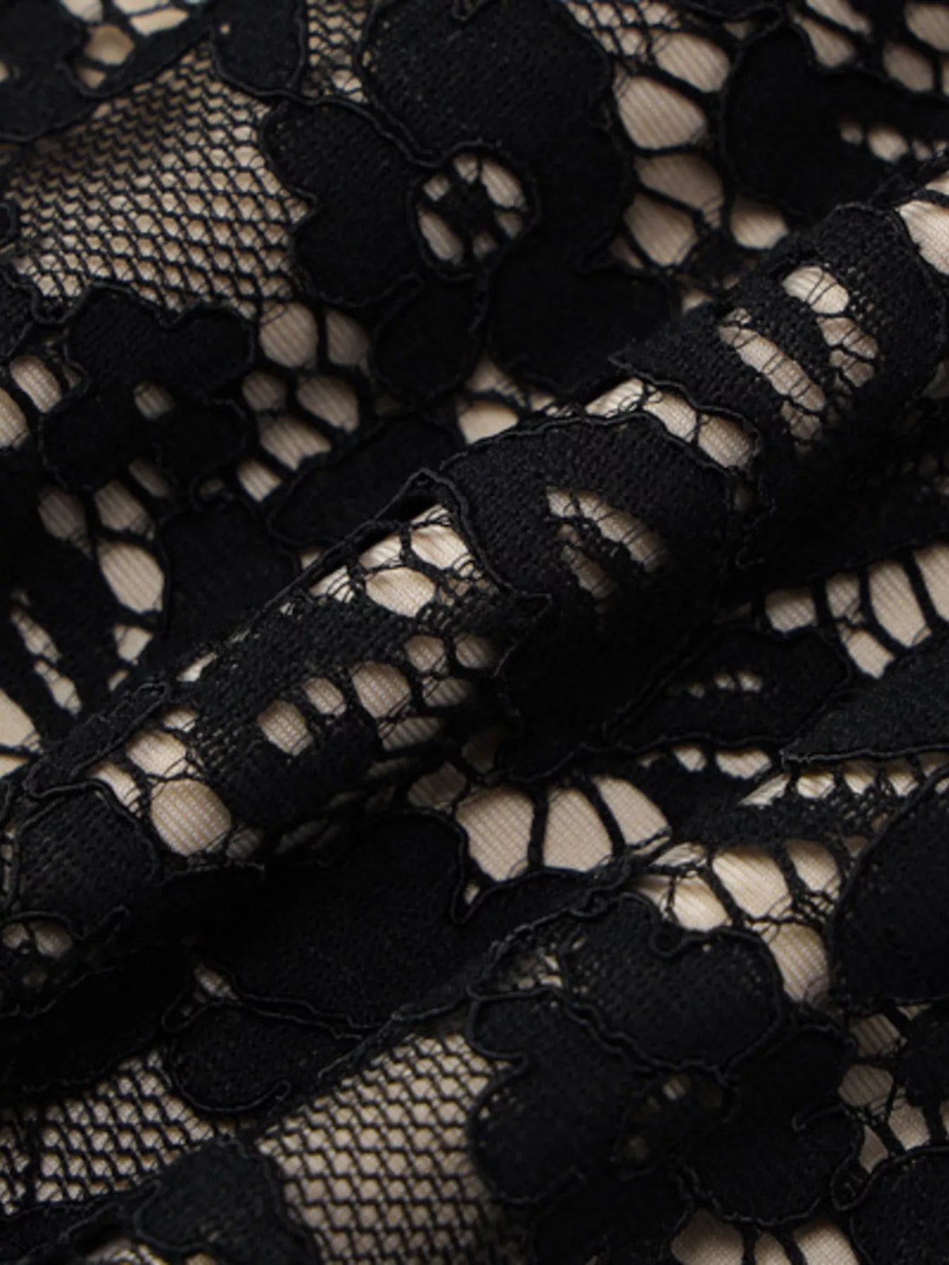 Lace mini dress fabric texture detail