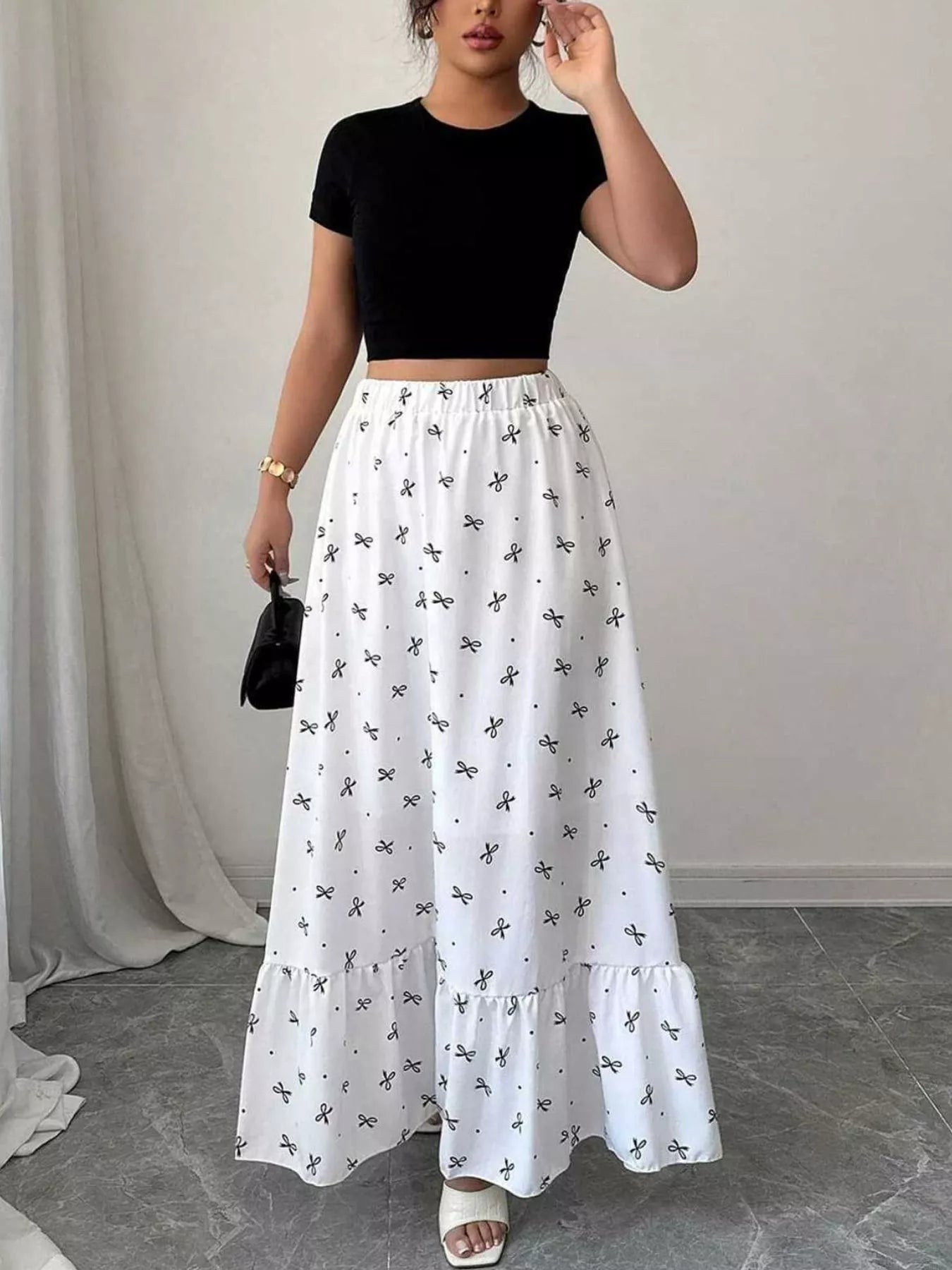 Bow print ruffle maxi skirt styled outfit view