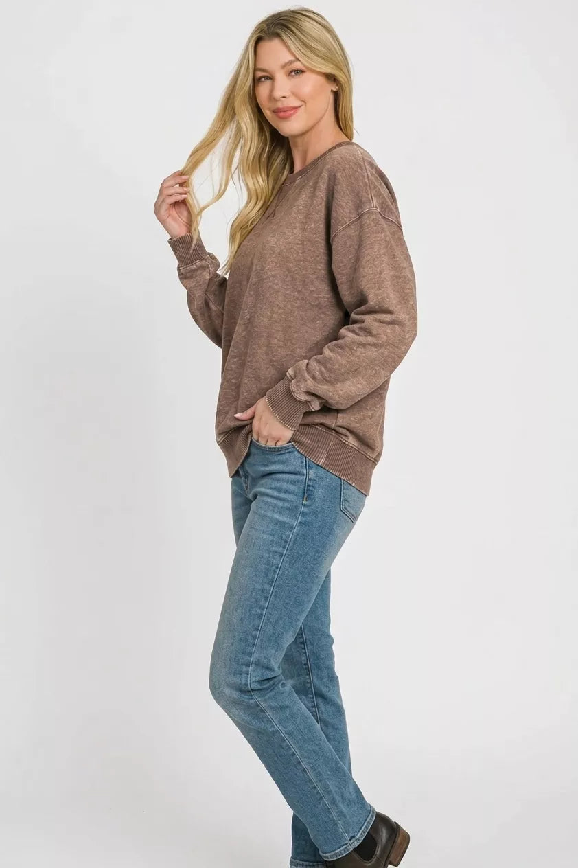Brown acid washed crewneck sweatshirt side view on model