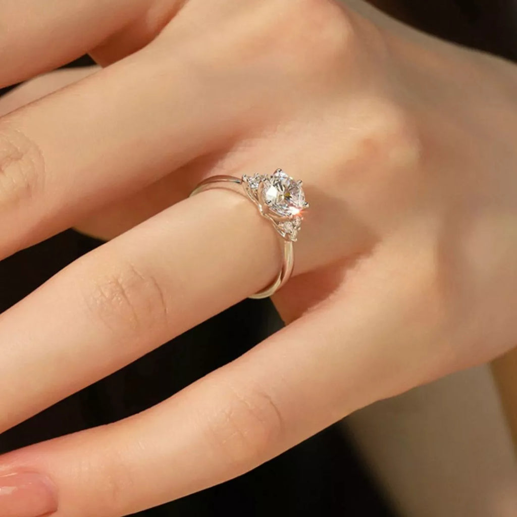1 carat moissanite ring on hand