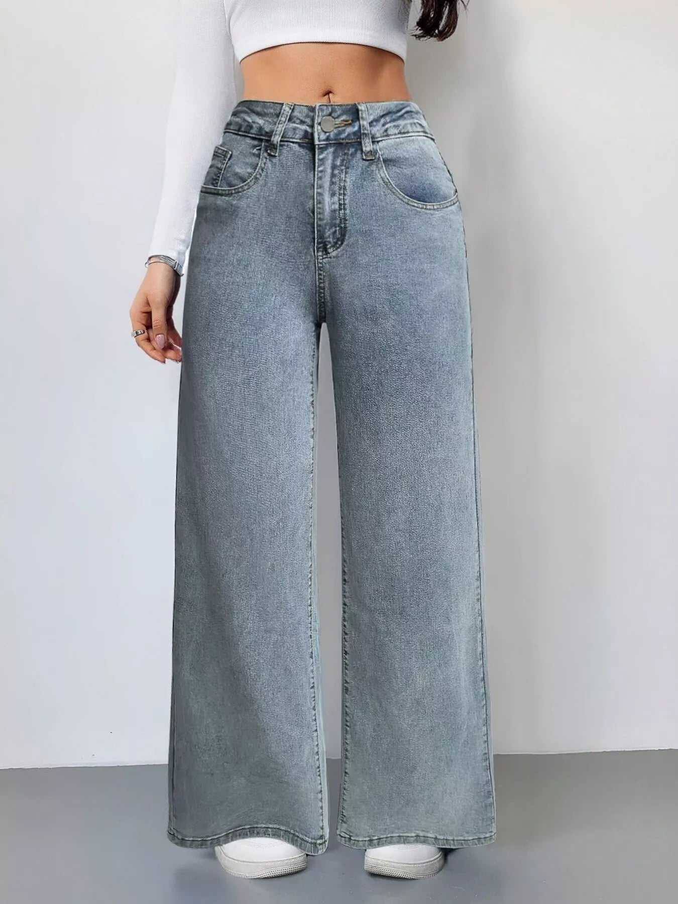 High waist wide leg jeans in light blue front view