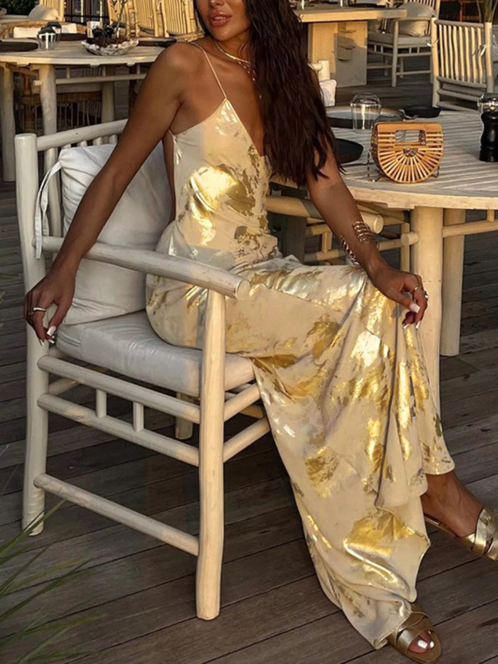 Gold maxi dress styled on model