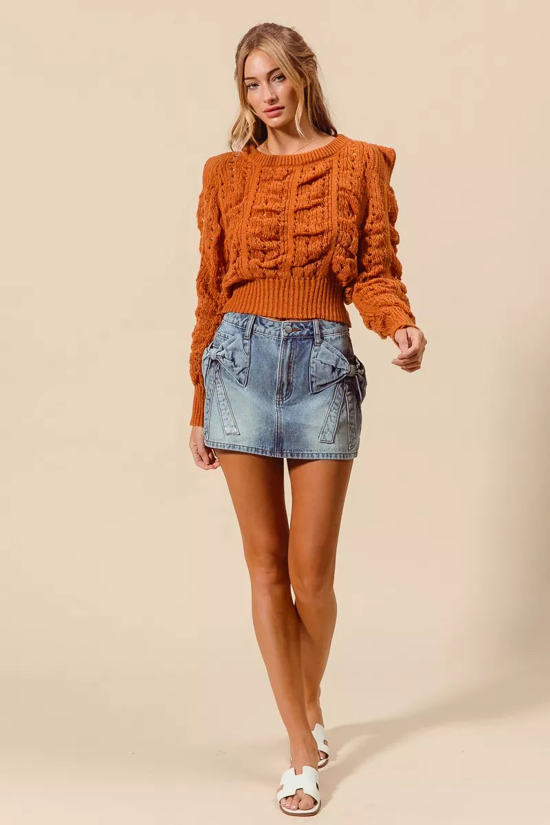 Distressed denim mini skirt on model