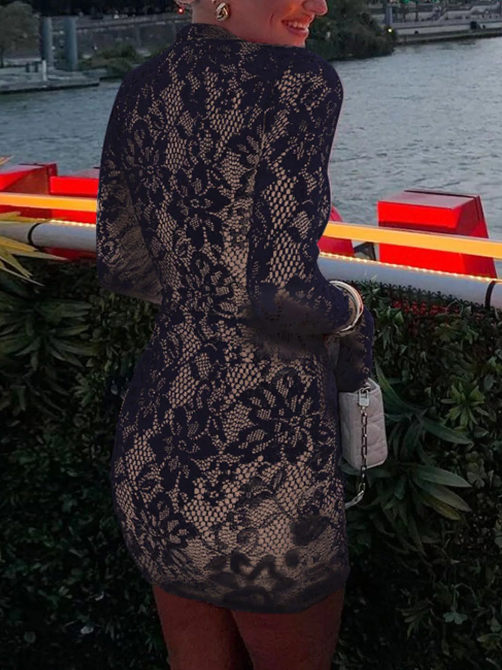 Lace cutout long sleeve mini dress close up of lace detail