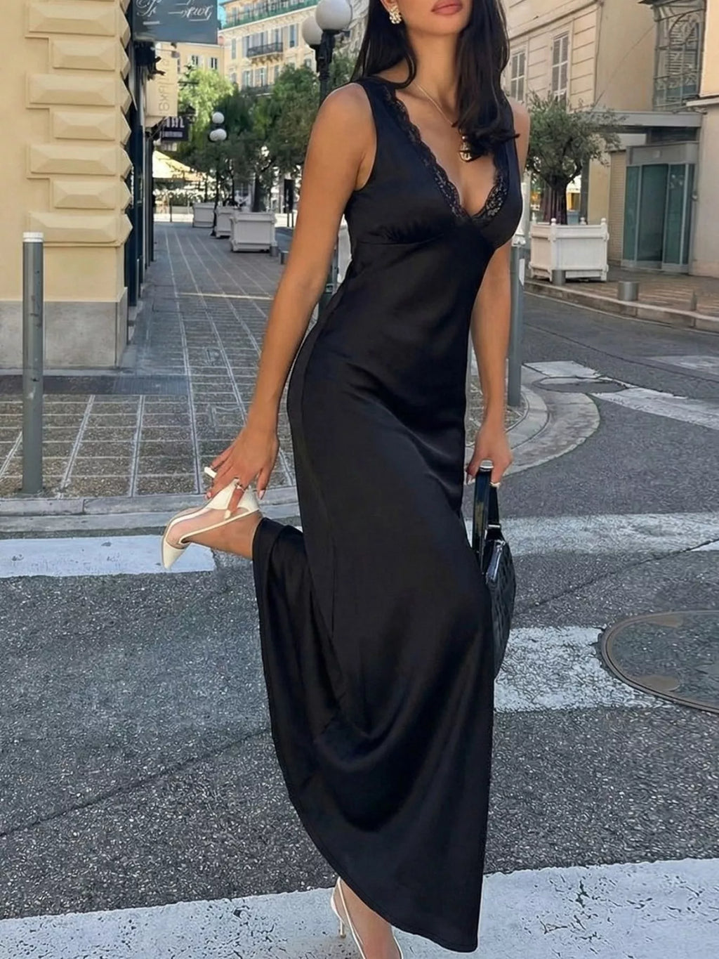 Black maxi dress back view showing tie waist
