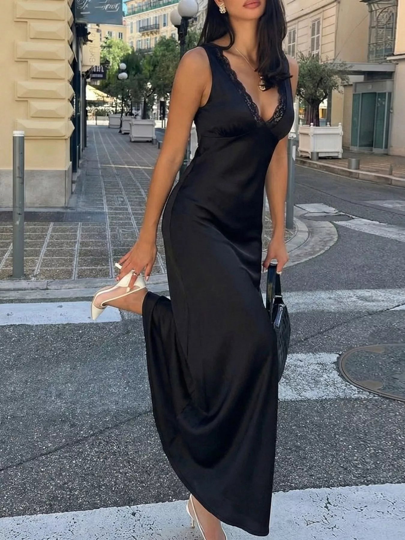 Black maxi dress back view showing tie waist