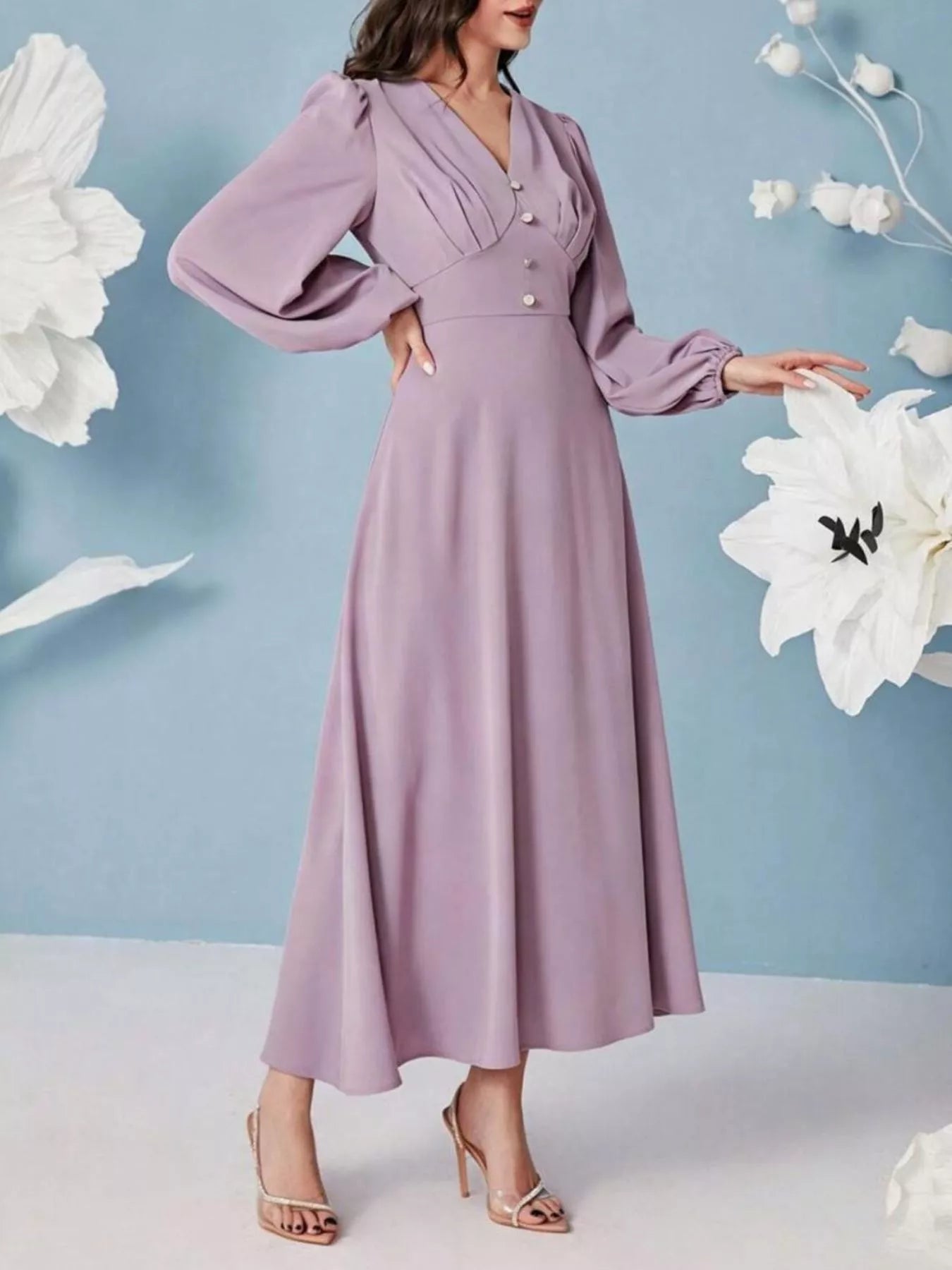 Ruched V neckline detail with decorative buttons