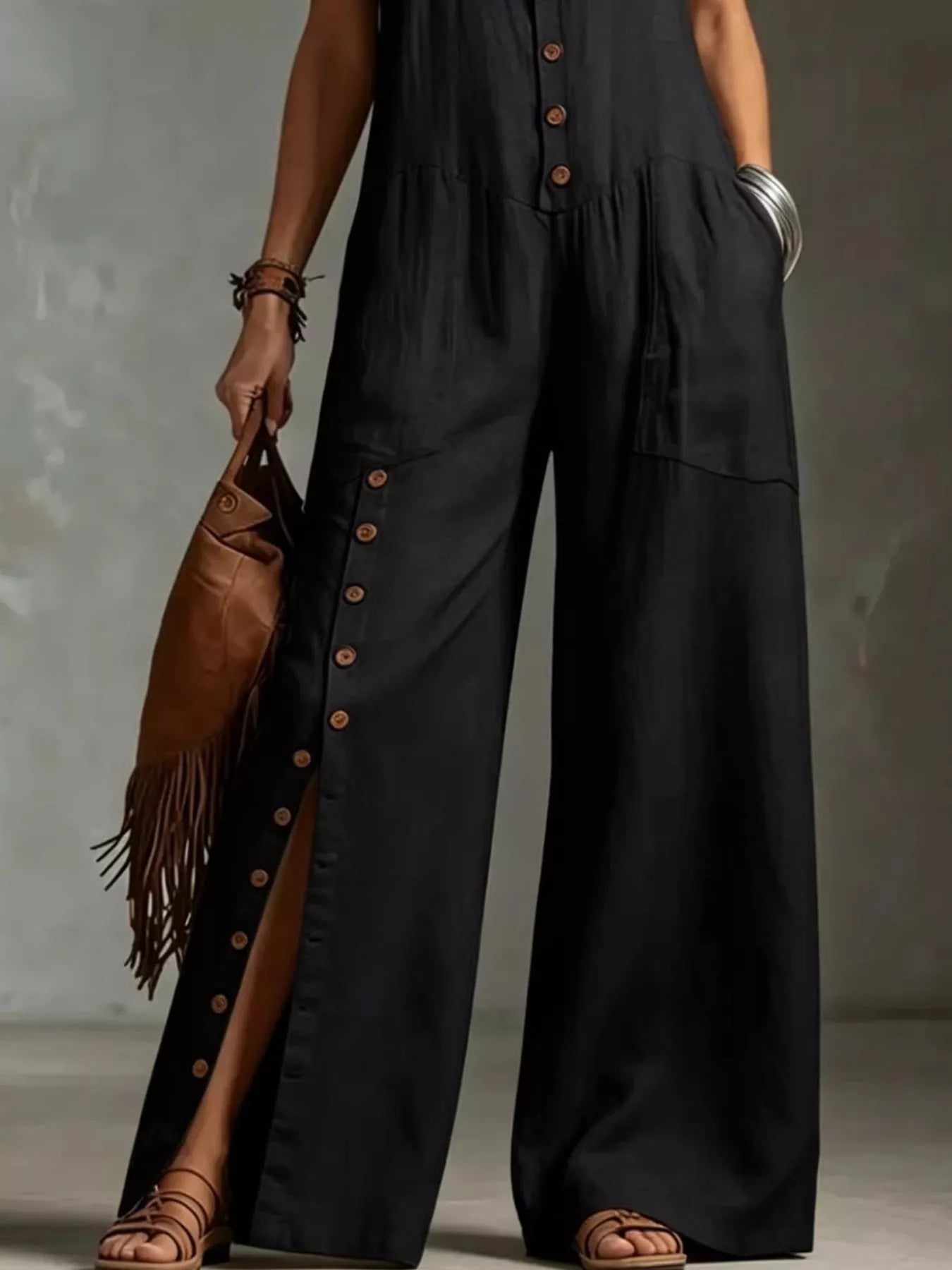 Black wide leg jumpsuit pocket and slit detail