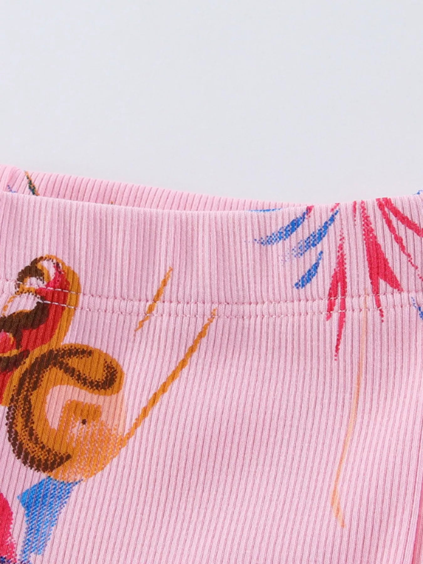 Girls flared leggings fairy print detail close up